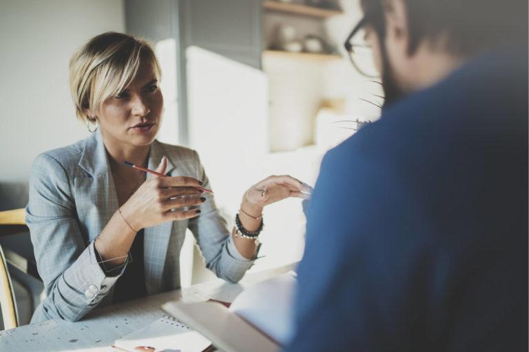 Businesswoman having a meeting with a man at an office
