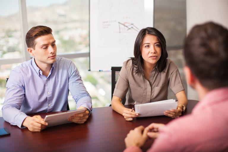 Women employer questioning a potential candidate